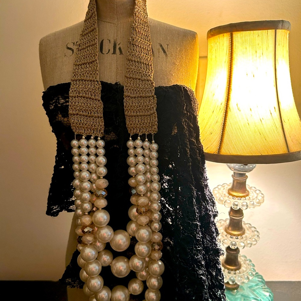 Rare vintage 4 strand faux pearl and gems. Slips on  over the head.